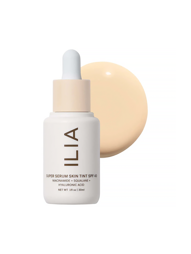 Ilia Super Serum Skin Tint SPF 40 in branded white bottle with pipette against product swatch on white background